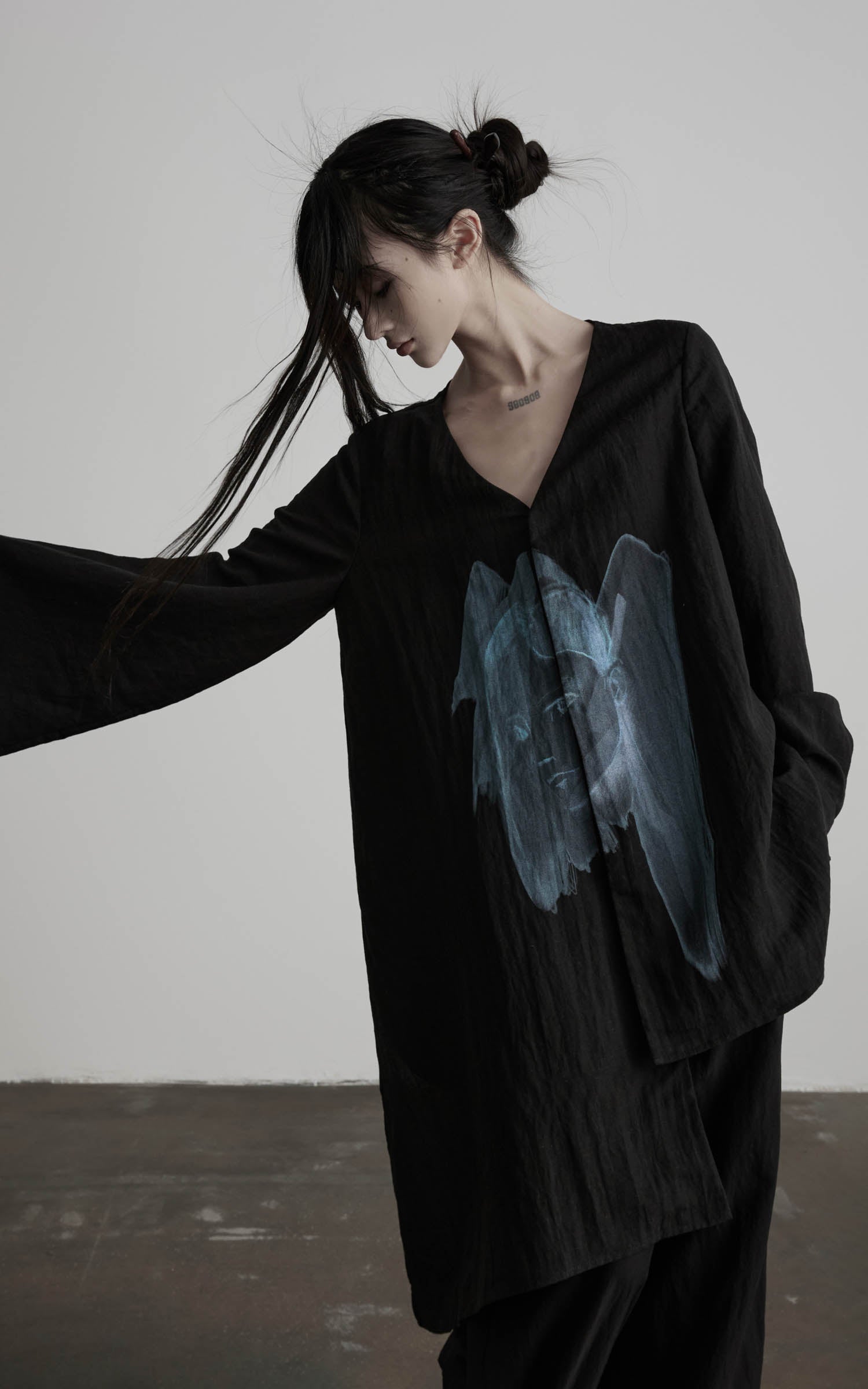 DOINDULGE Asymmetric V-Neck Printed Shirt