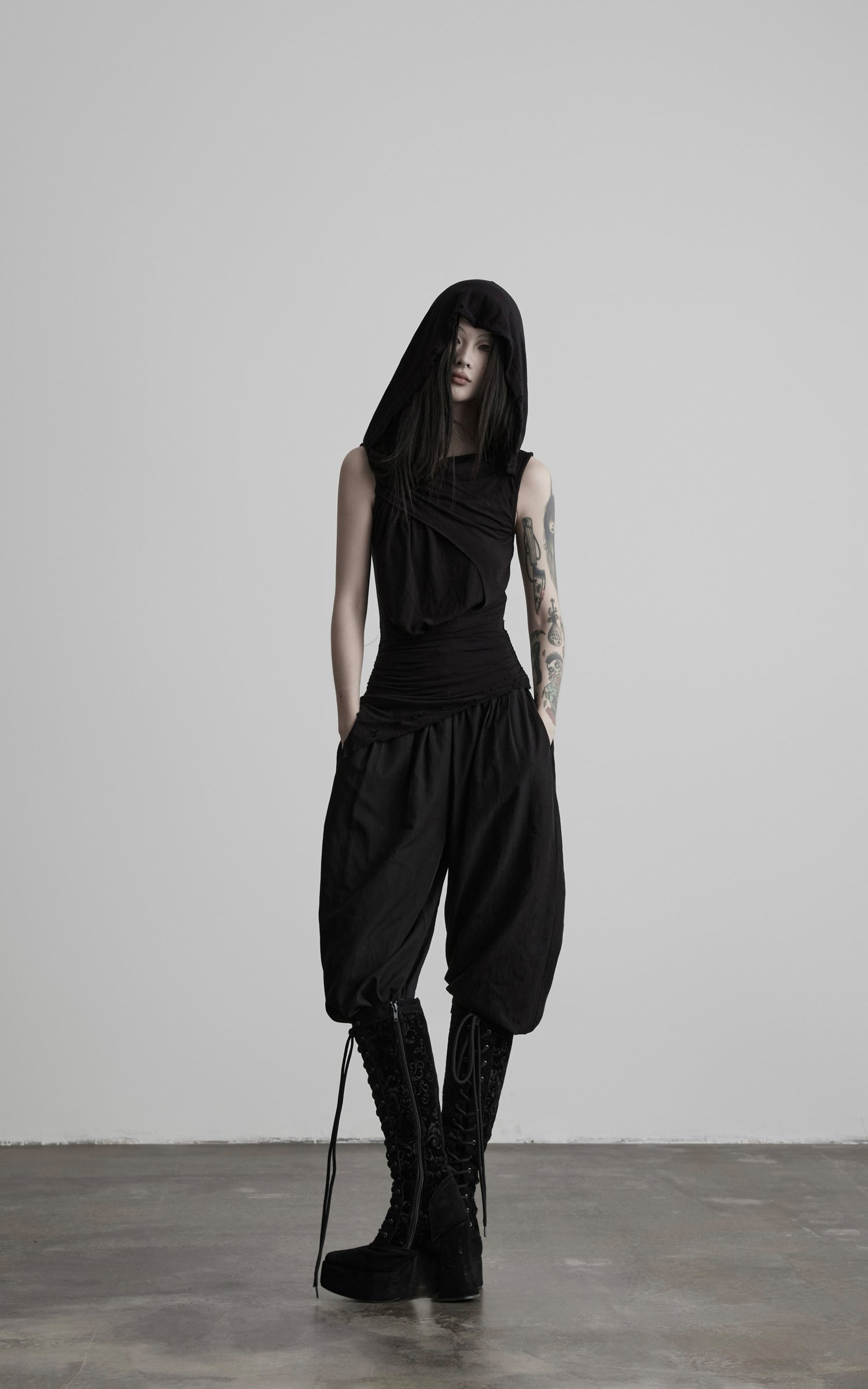 DOINDULGE Hooded Draped Sleeveless Knit Top