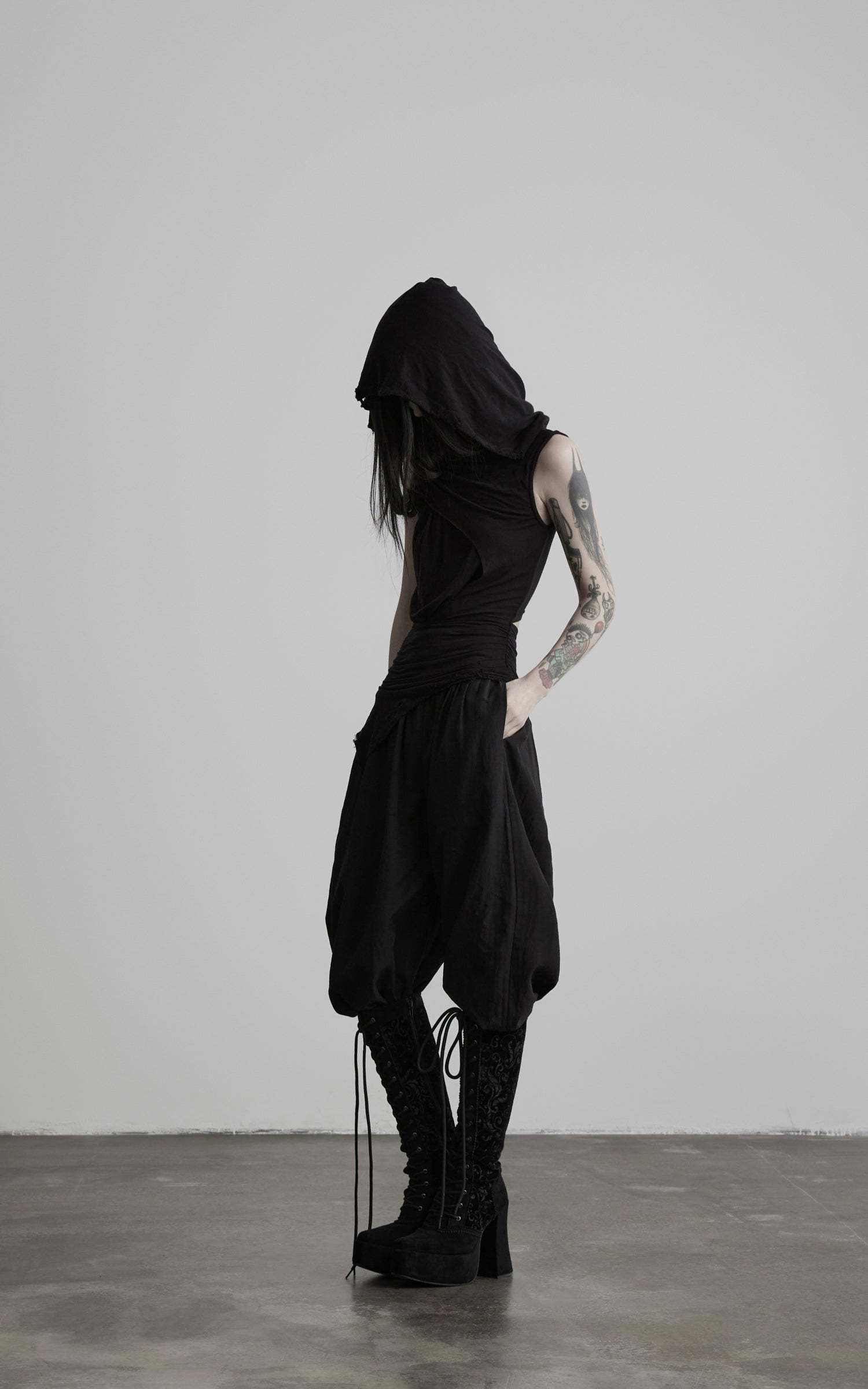 DOINDULGE Hooded Draped Sleeveless Knit Top