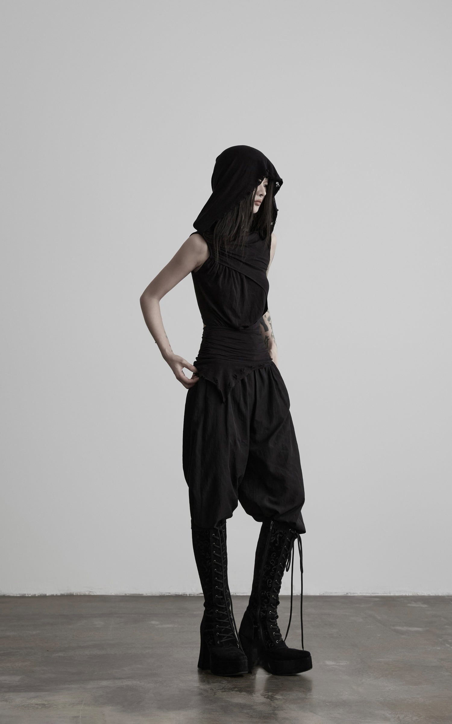 DOINDULGE Hooded Draped Sleeveless Knit Top