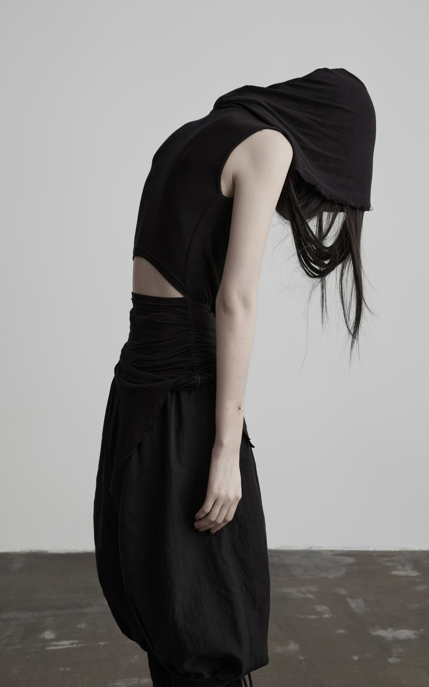 DOINDULGE Hooded Draped Sleeveless Knit Top