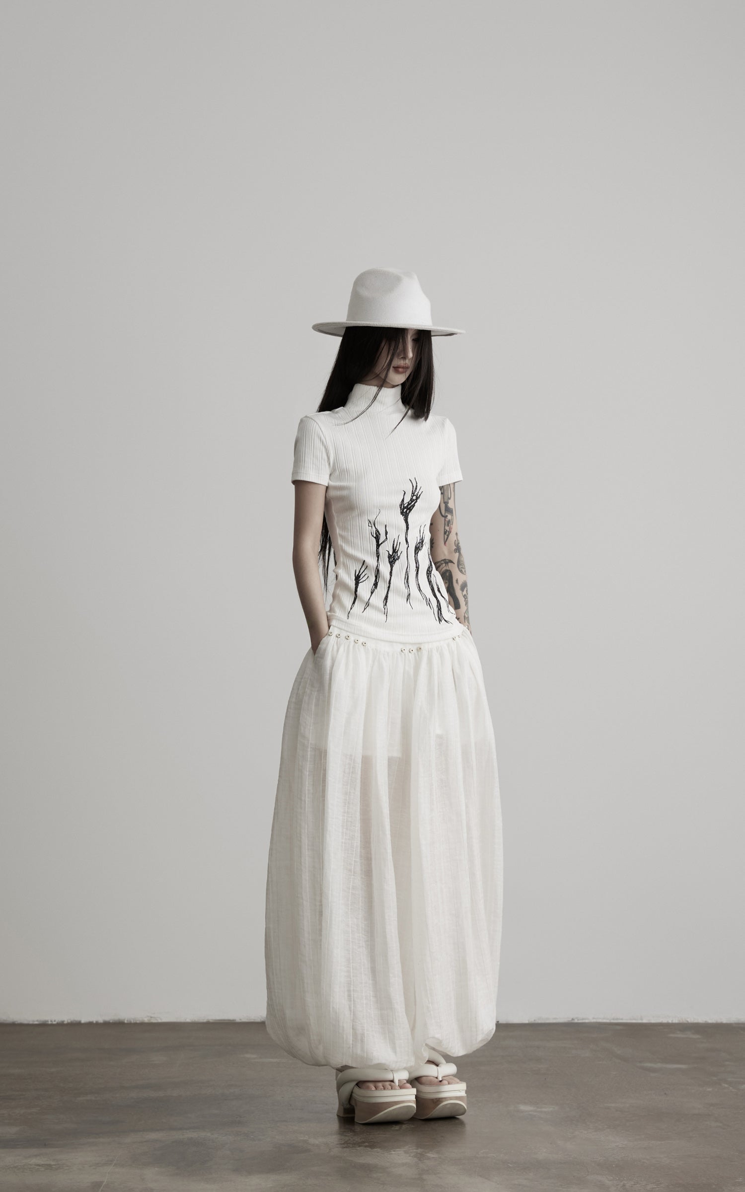 DOINDULGE Low-Rise Sheer Gathered Wide-Leg Pants
