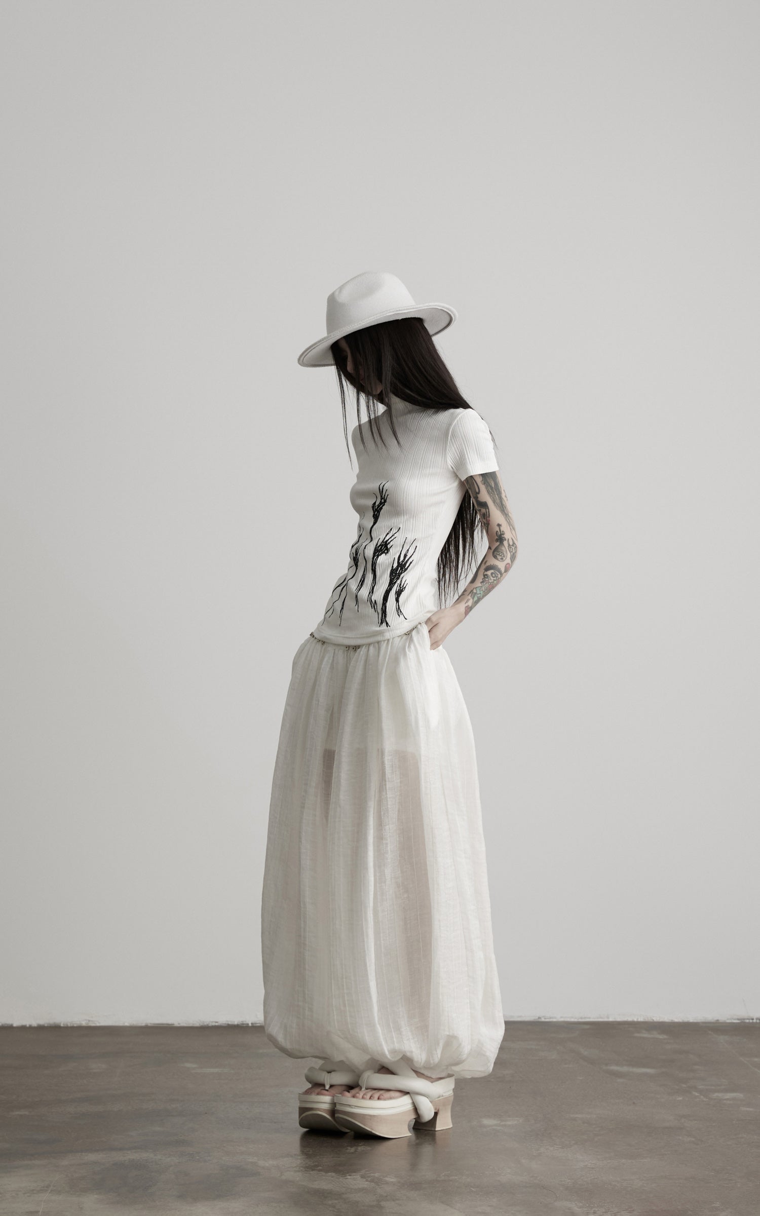 DOINDULGE Half Mock Neck Embroidered Ribbed Knit Top