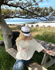 Rase le sol Amor Fati Off-Shoulder Oversized T-Shirt