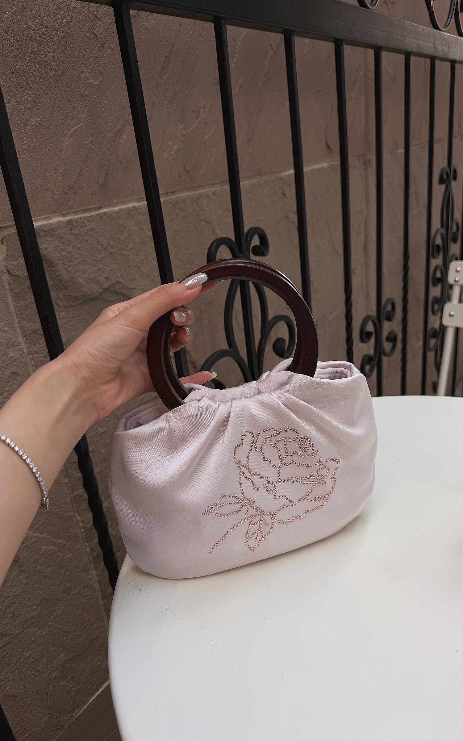 Hydrae Rhinestone Rose Satin Mini Handbag with Sculptural Wooden Ring Handles