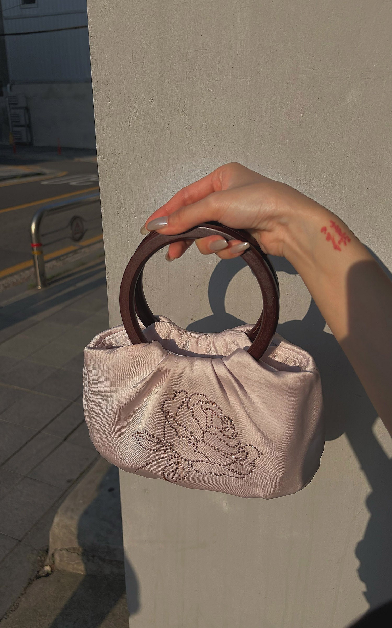 Hydrae Rhinestone Rose Satin Mini Handbag with Sculptural Wooden Ring Handles