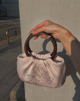 Hydrae Rhinestone Rose Satin Mini Handbag with Sculptural Wooden Ring Handles