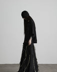 DOINDULGE Low-Rise Frayed Denim Maxi Skirt