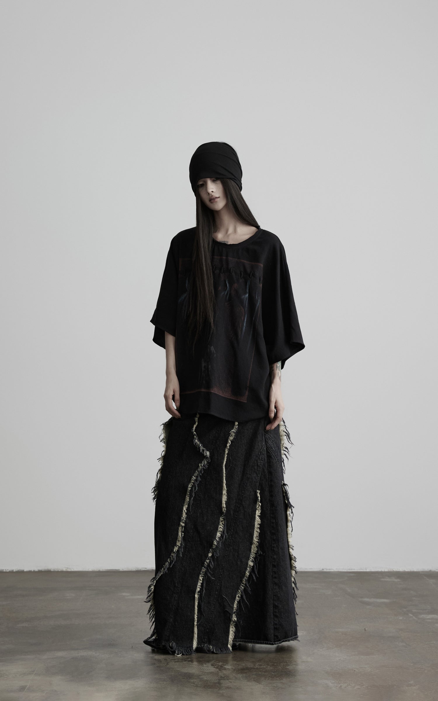 DOINDULGE Low-Rise Frayed Denim Maxi Skirt
