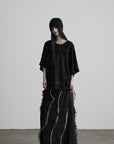 DOINDULGE Low-Rise Frayed Denim Maxi Skirt