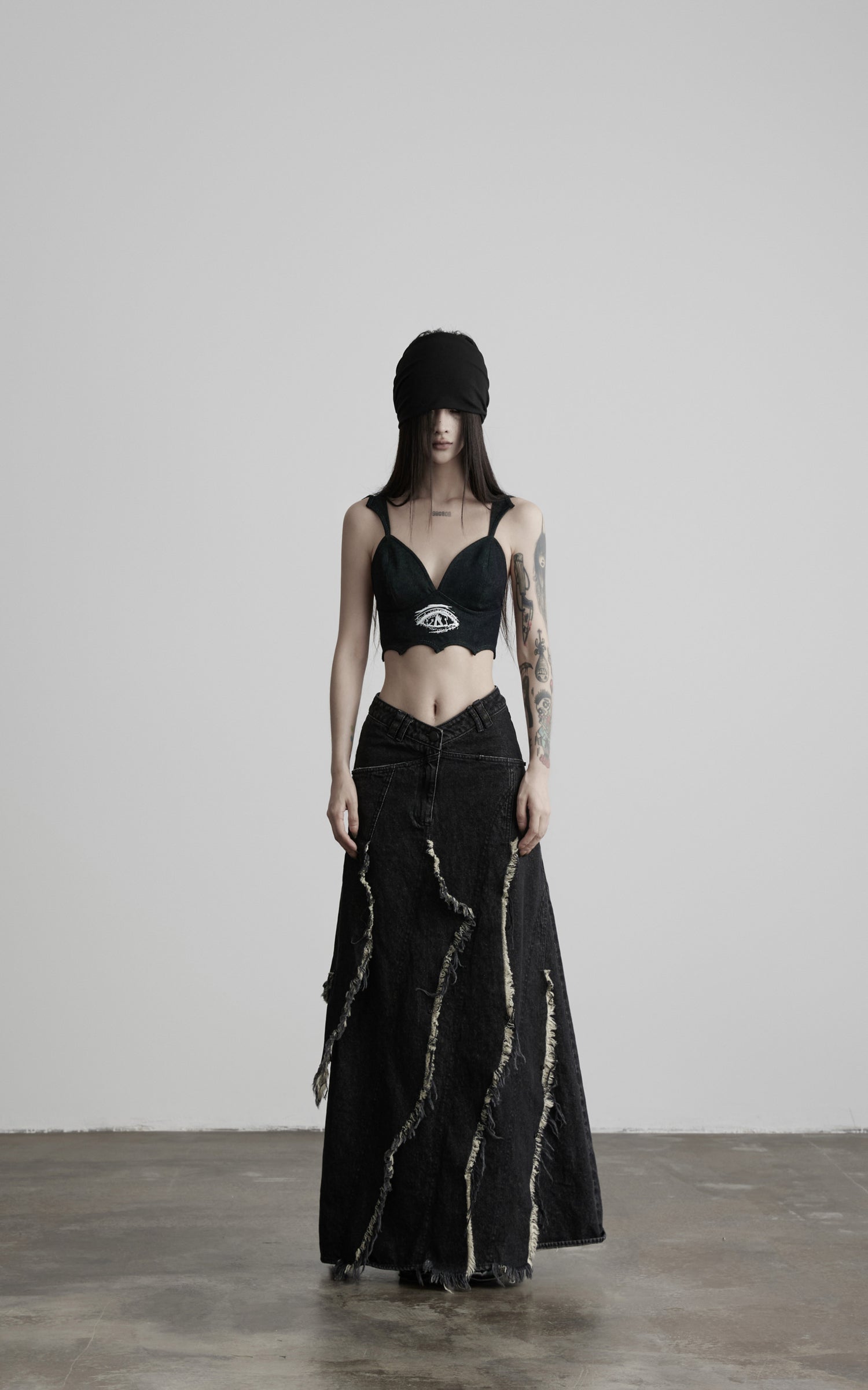 DOINDULGE Low-Rise Frayed Denim Maxi Skirt