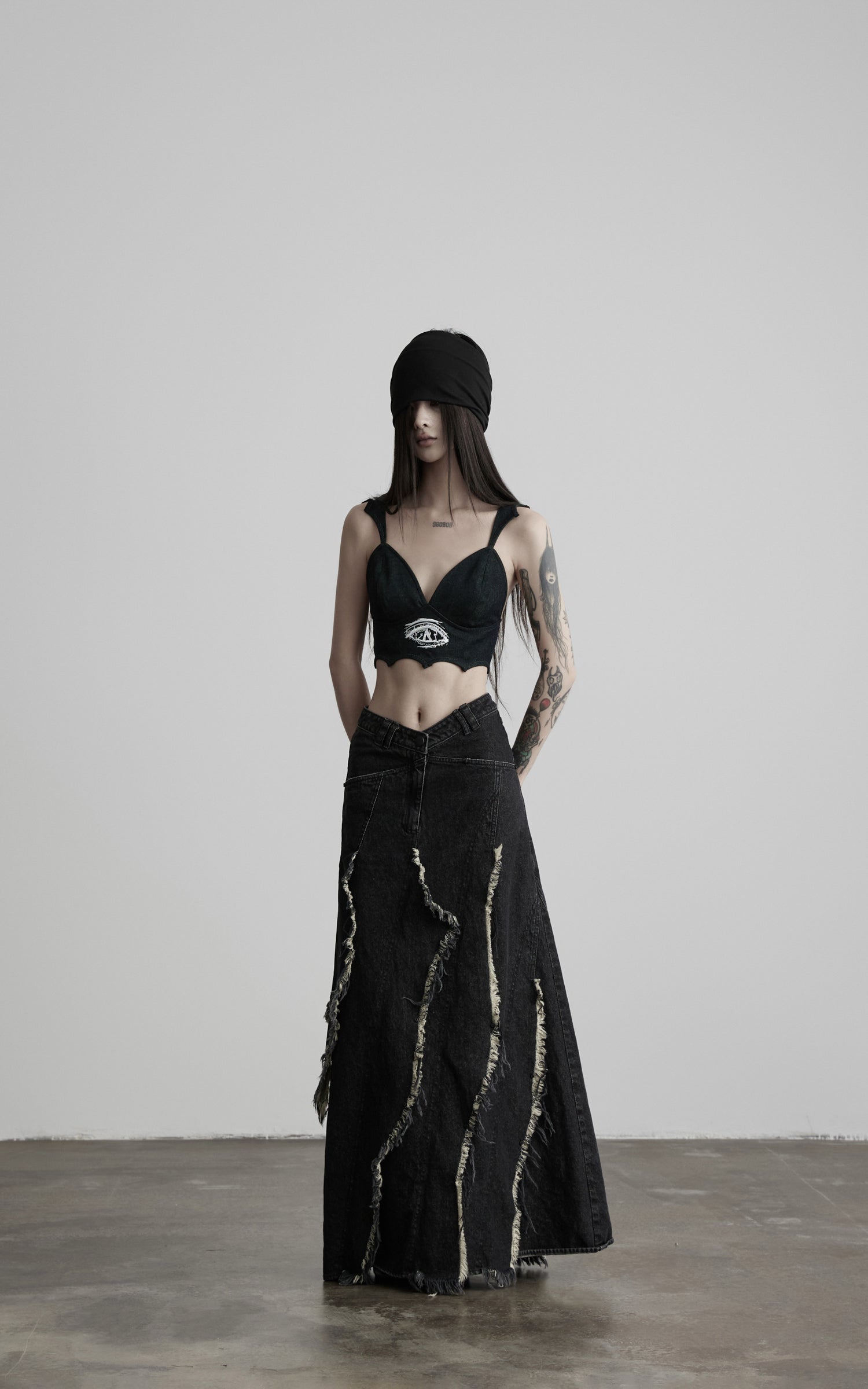 DOINDULGE Low-Rise Frayed Denim Maxi Skirt