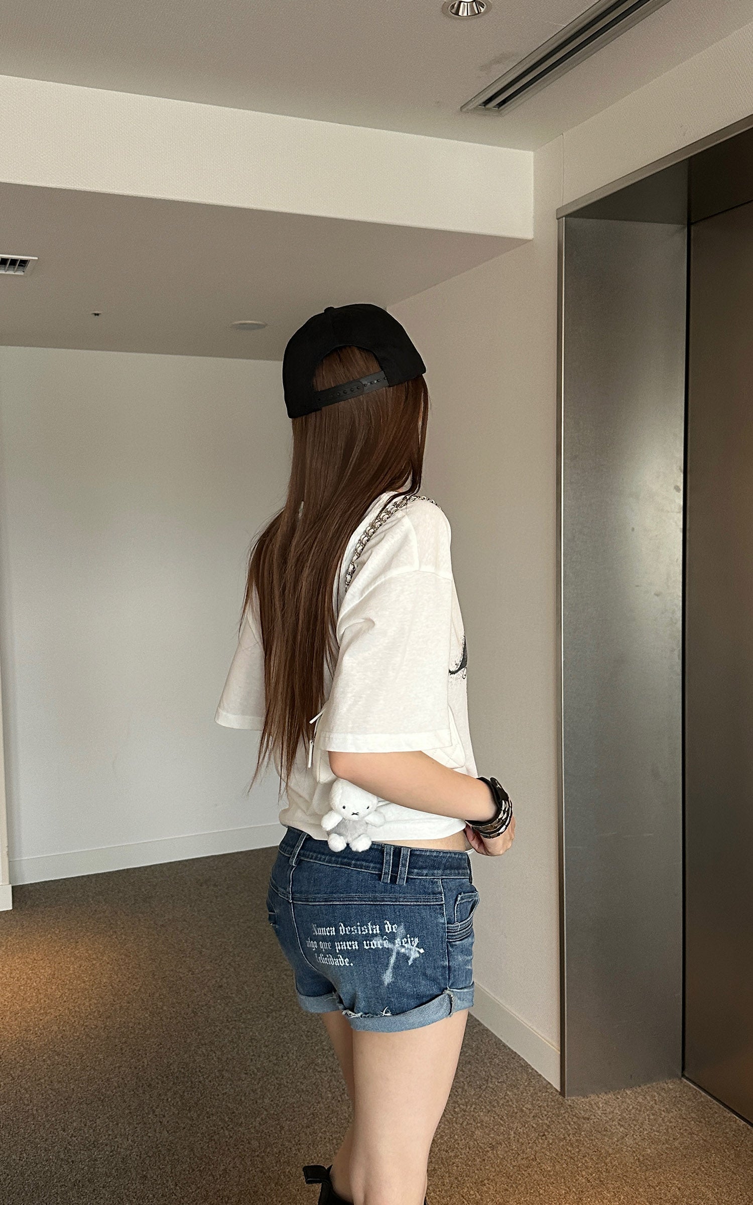 Rase le sol Distressed Denim Mini Shorts with Back Graphic Print and Raw Hem Detail