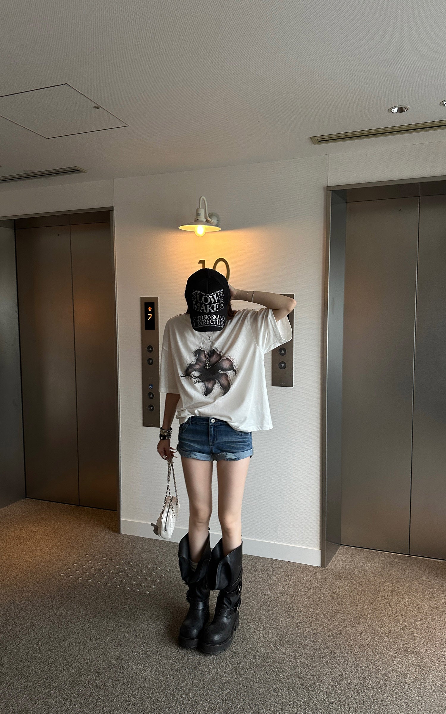 Rase le sol Distressed Denim Mini Shorts with Back Graphic Print and Raw Hem Detail