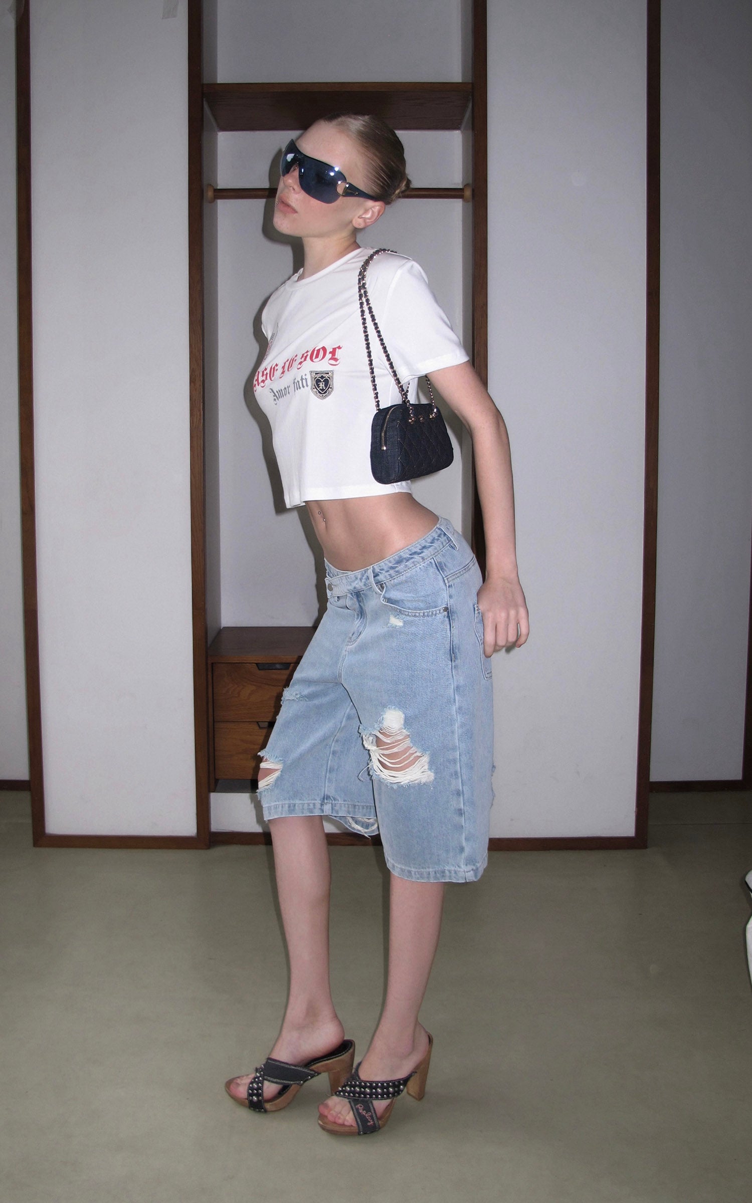 Rase le sol Low-Rise Asymmetric Waist Distressed Denim Pants