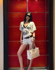ROVENTE Layered Lace Bralette and Deep V Draped Graphic Tee Two-Piece Set