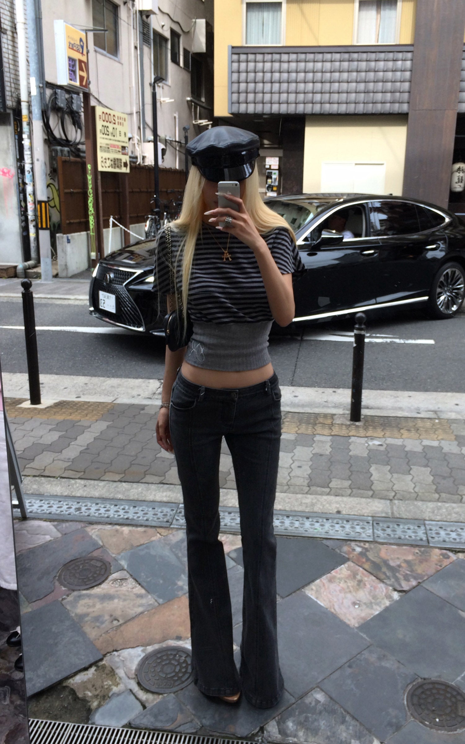 Rase le sol Dark Washed Flare Denim Pants with Slim Fit and Extended Bell Bottom Silhouette