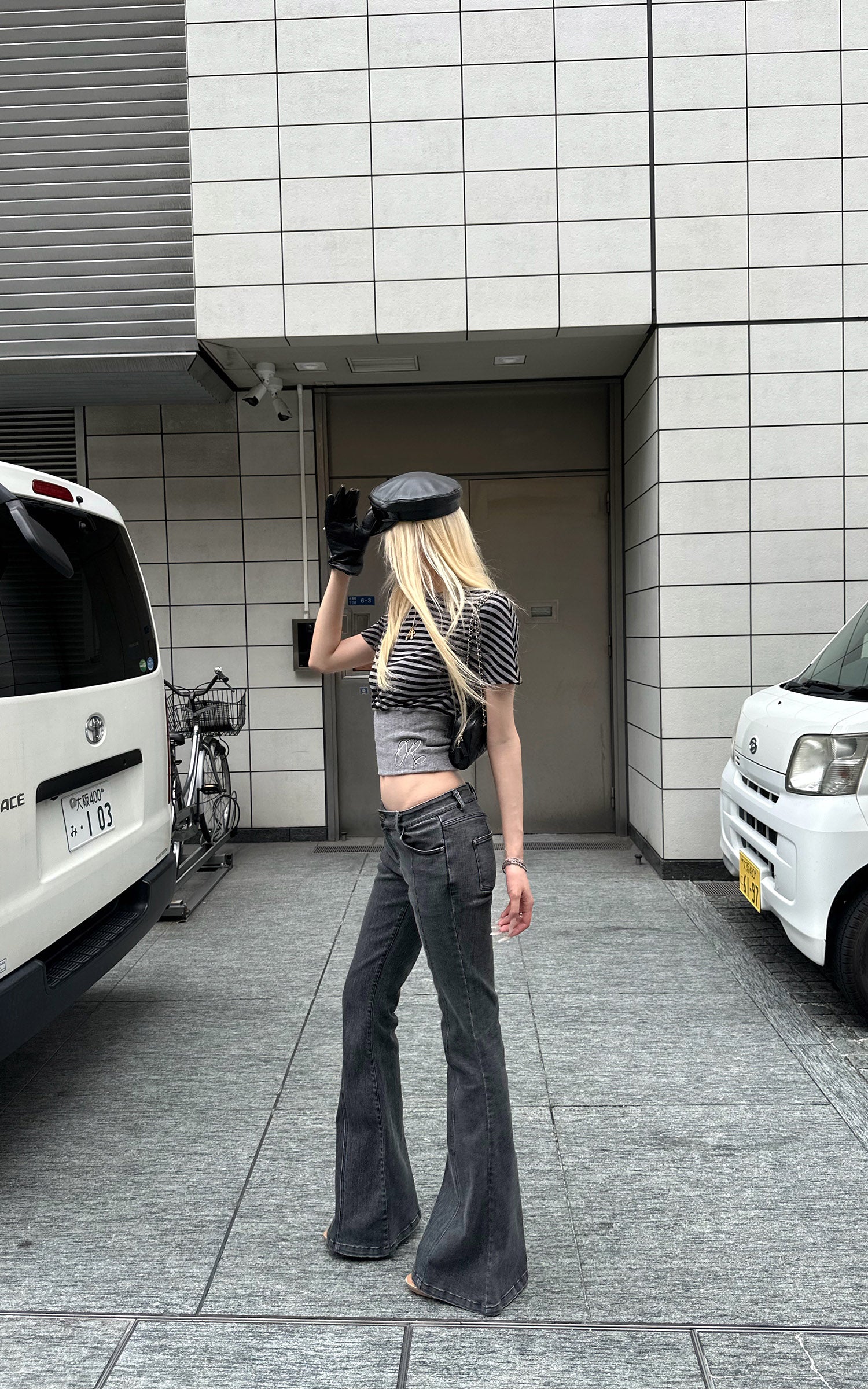 Rase le sol Dark Washed Flare Denim Pants with Slim Fit and Extended Bell Bottom Silhouette
