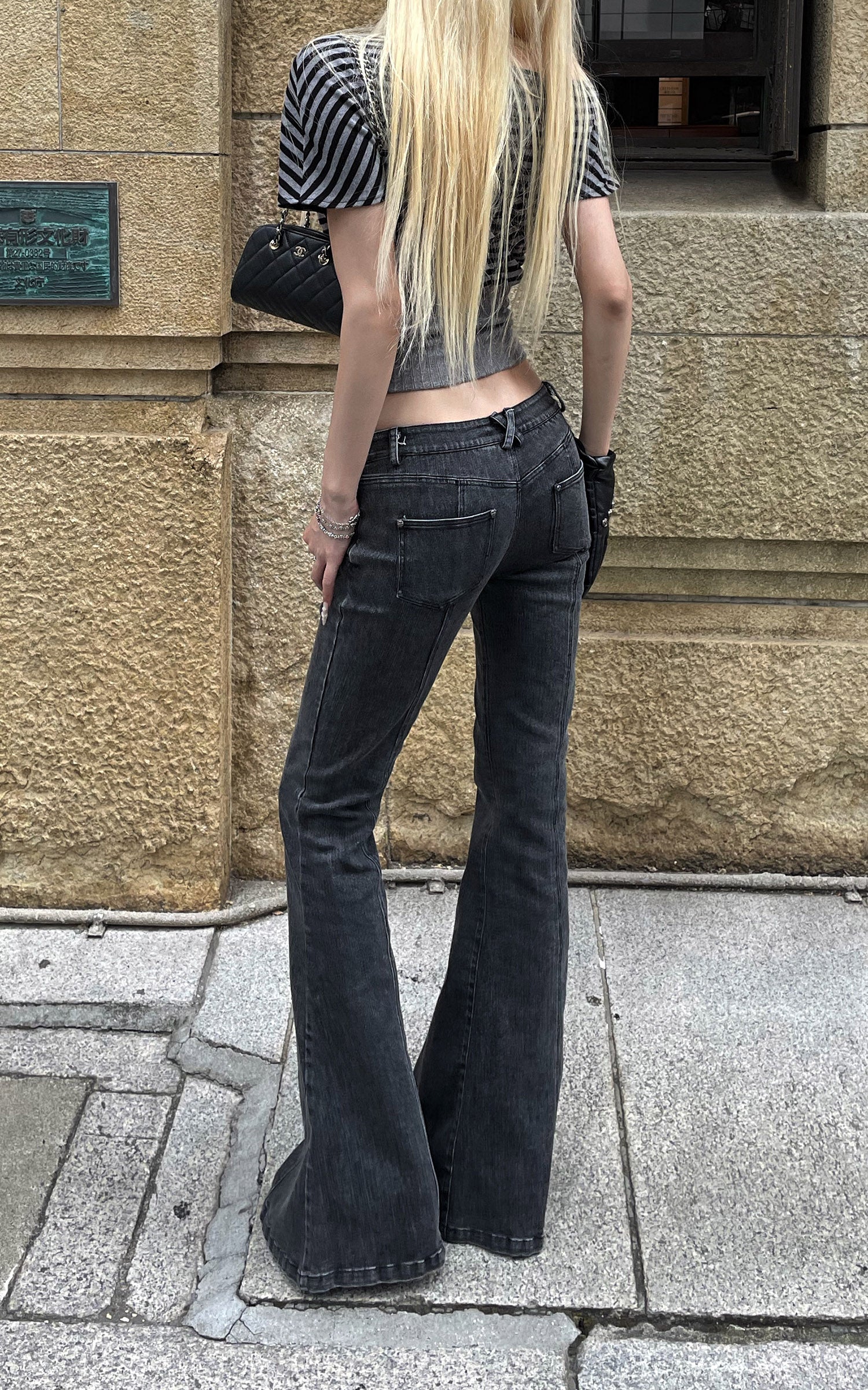 Rase le sol Dark Washed Flare Denim Pants with Slim Fit and Extended Bell Bottom Silhouette