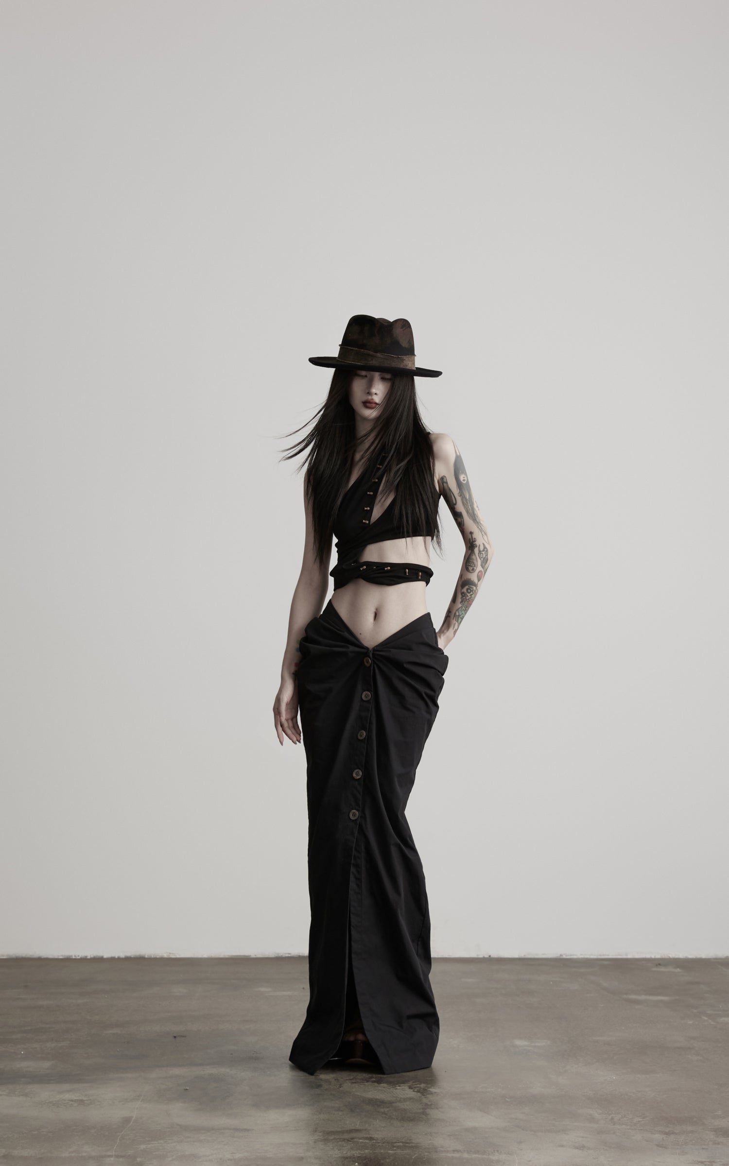DOINDULGE Asymmetric One-Shoulder Cutout Knit Bodysuit