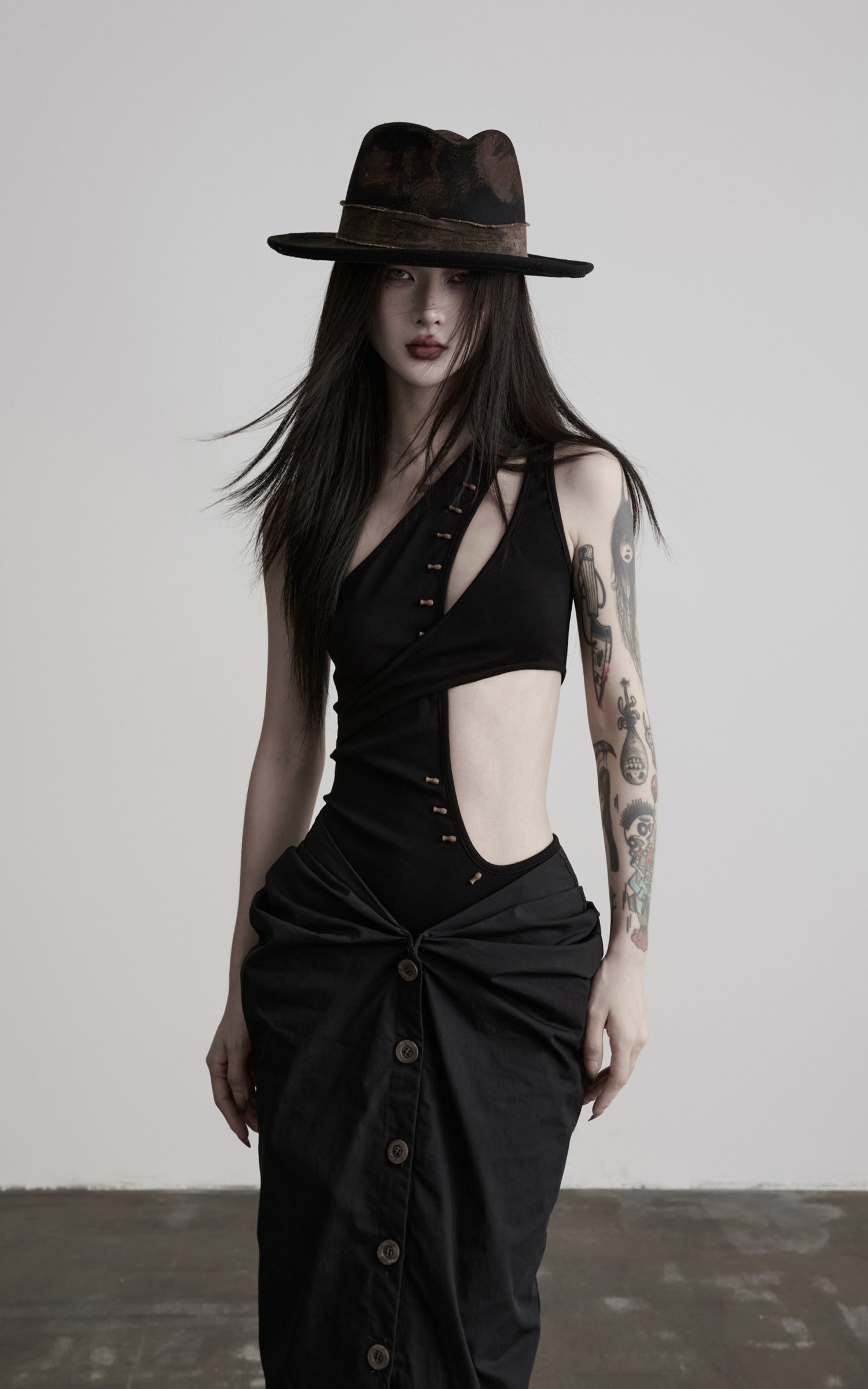 DOINDULGE Asymmetric One-Shoulder Cutout Knit Bodysuit
