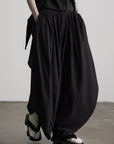DOINDULGE Asymmetric Textured Wide-Leg Palazzo Pants