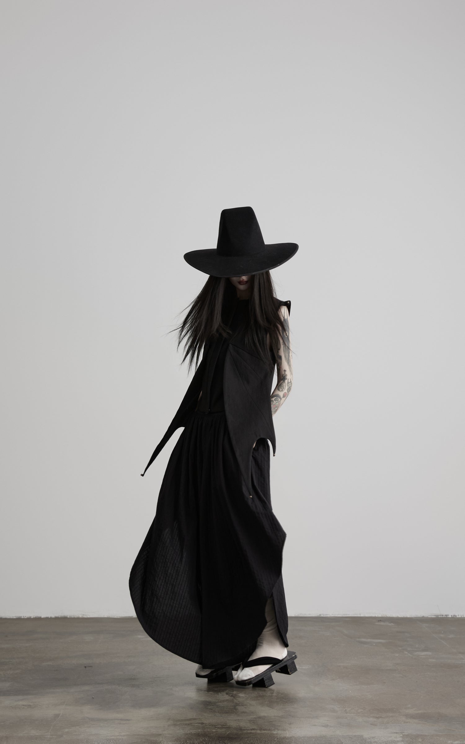 DOINDULGE Asymmetric Textured Wide-Leg Palazzo Pants