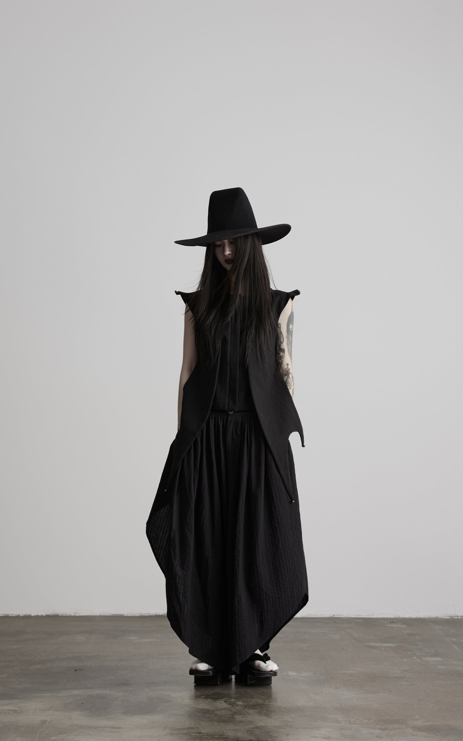 DOINDULGE Asymmetric Textured Wide-Leg Palazzo Pants