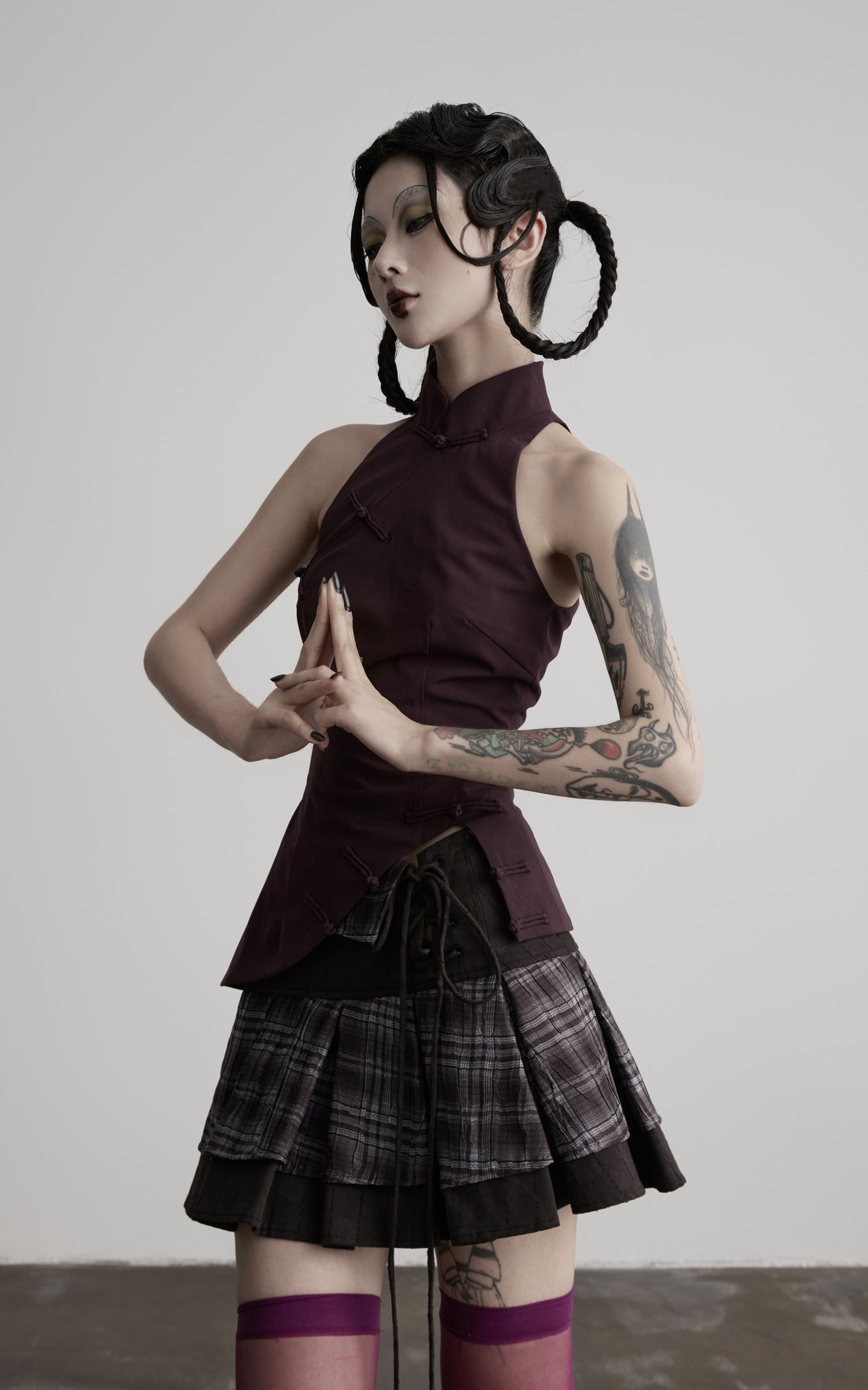 DOINDULGE Lace-Up Layered Pleated Mini Skirt