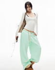 IAMXIAA Scoop Neck Pocket Long Sleeve Tee