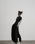 DOINDULGE Low-Rise Pleated Wide-Leg Balloon Pants