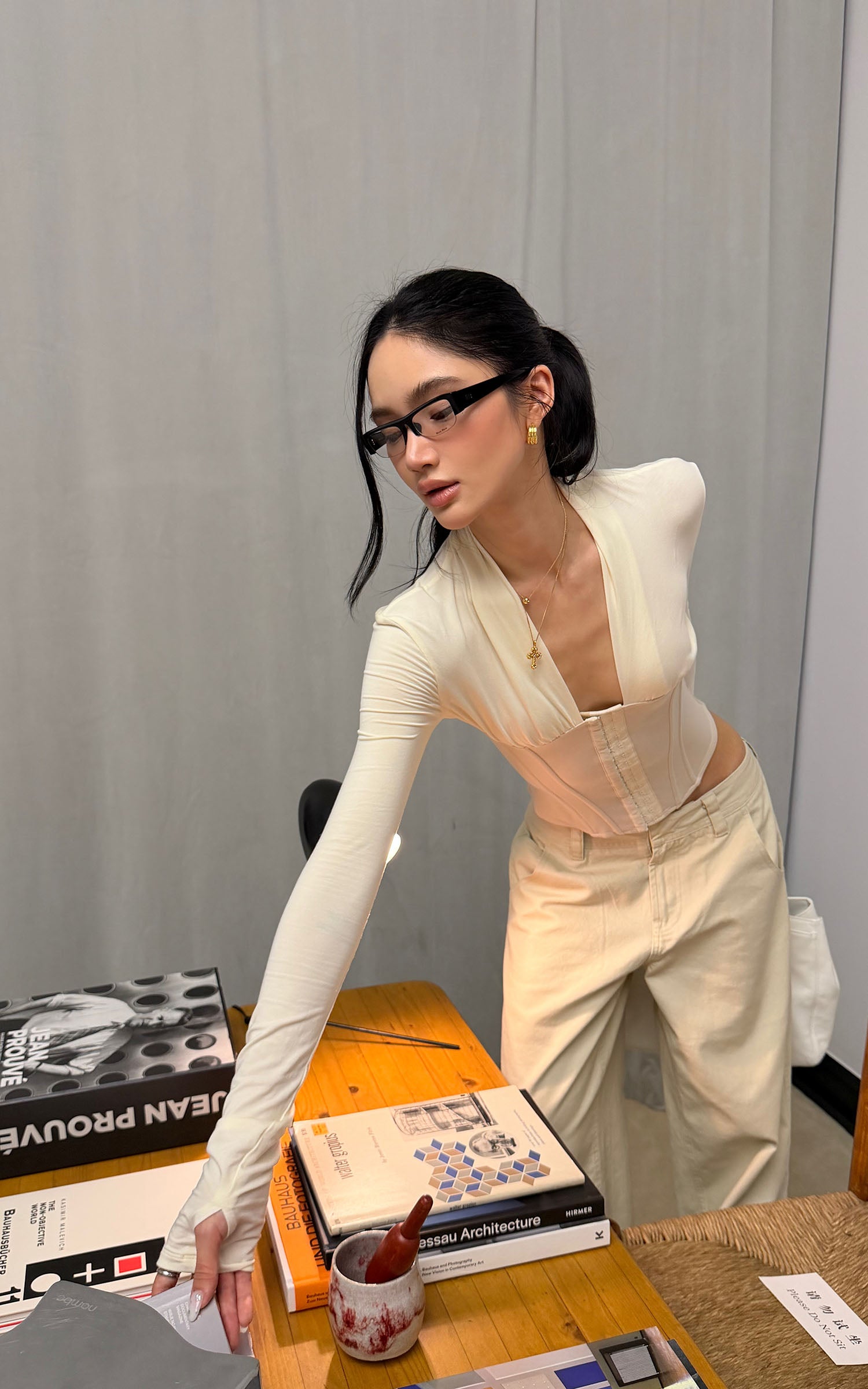 ROVENTE Draped Plunge Corset Long Sleeve Top