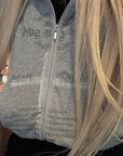 Rase le sol Sweat à capuche zippé imprimé & Ensemble pantalon de survêtement à jambe large