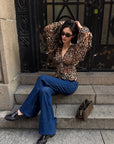 ROVENTE Leopard Chiffon Deep V Ruched Tie-Front Flared Blouse