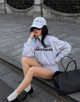 ROVENTE Cropped Zip Jacket and Mini Shorts Set with Embroidered Script Detail and Relaxed Sporty Silhouette