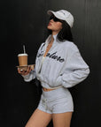 ROVENTE Cropped Zip Jacket and Mini Shorts Set with Embroidered Script Detail and Relaxed Sporty Silhouette