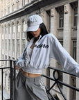 ROVENTE Cropped Zip Jacket and Mini Shorts Set with Embroidered Script Detail and Relaxed Sporty Silhouette