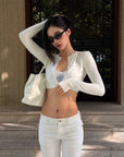 ROVENTE Low-Rise Slim Fit White Denim Flare Jeans