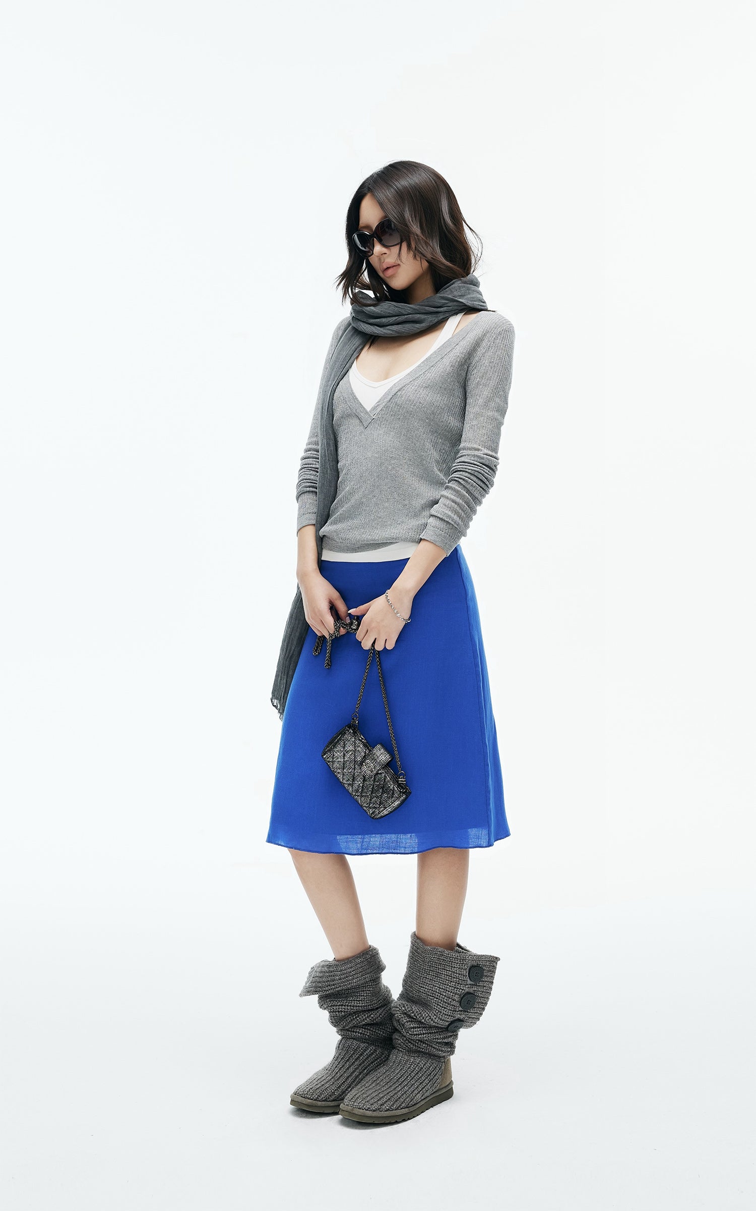 IAMXIAA Deep V-Neck Sheer Knit Sweater