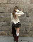 Rase le sol Ivory Ruffled Tie-Front Asymmetric Blouse