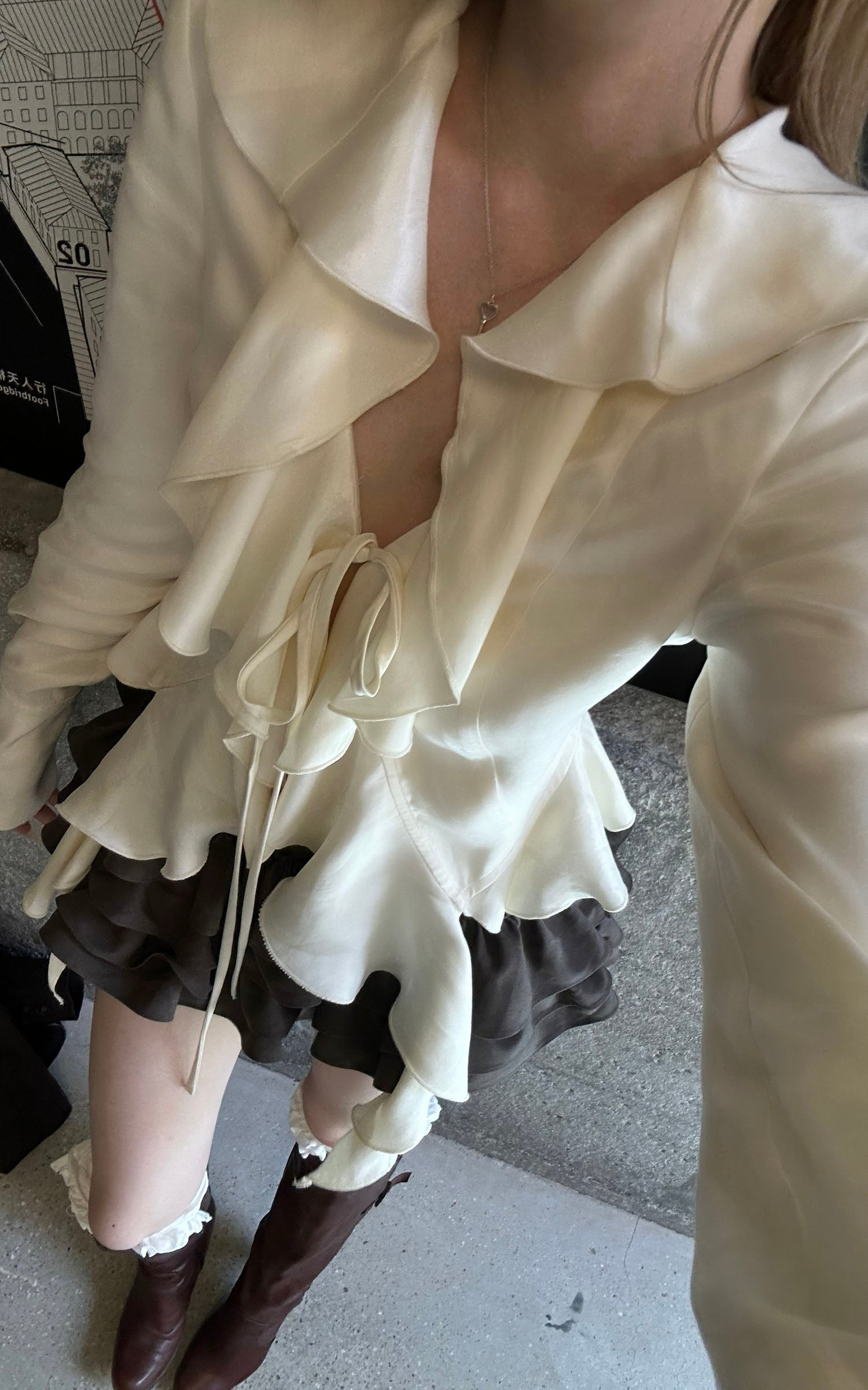Rase le sol Ivory Ruffled Tie-Front Asymmetric Blouse