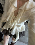 Rase le sol Ivory Ruffled Tie-Front Asymmetric Blouse