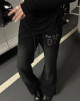Rase le sol Pantalon de survêtement évasé à taille basse et motif délavé