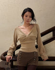 Hydrae Twist-Front Deep V-Neck Knit Top