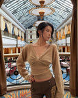 Hydrae Twist-Front Deep V-Neck Knit Top