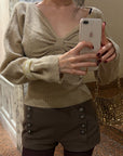 Hydrae Twist-Front Deep V-Neck Knit Top