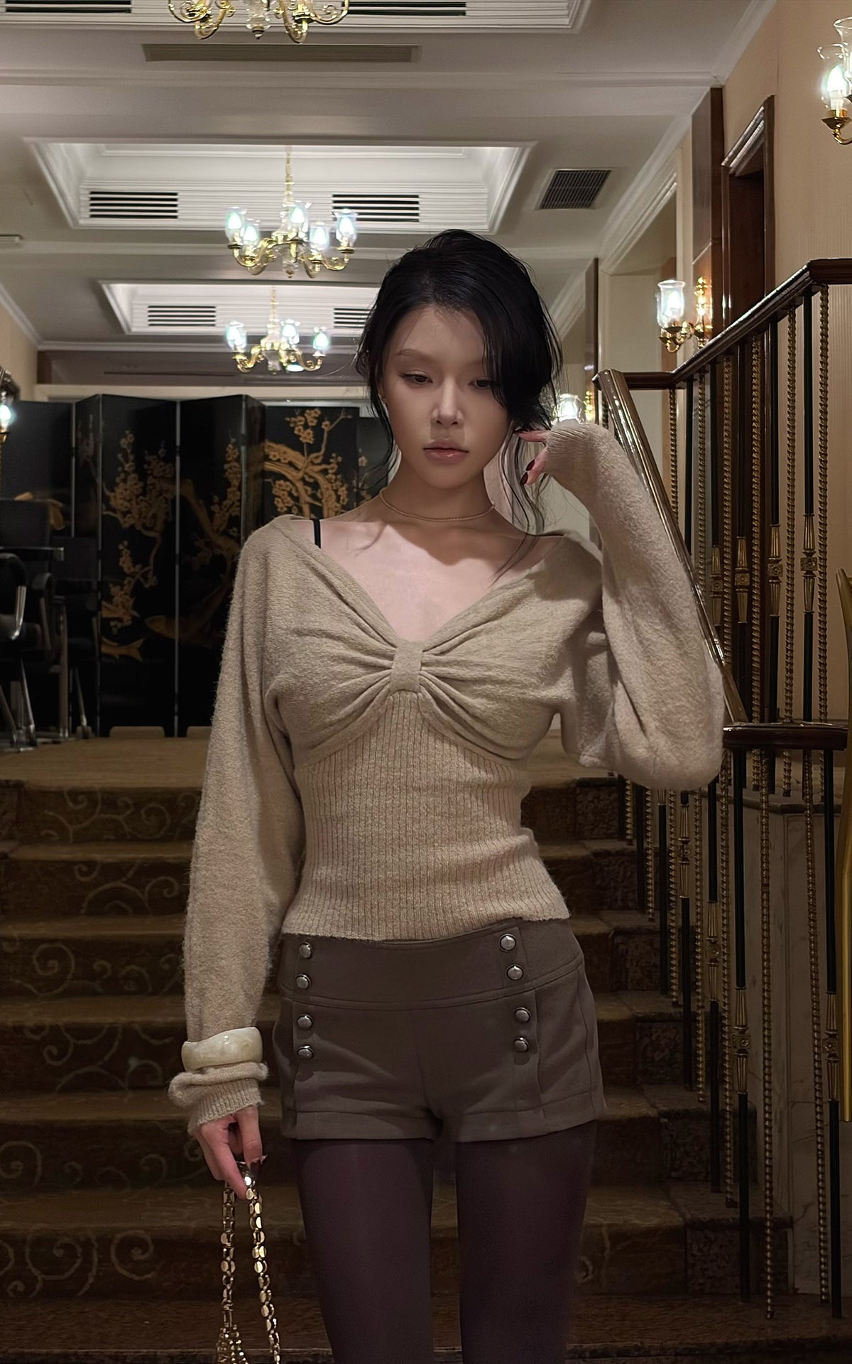 Hydrae Twist-Front Deep V-Neck Knit Top