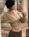Hydrae Twist-Front Deep V-Neck Knit Top
