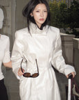 Hydrae Ivory High-Neck Belted Longline Trench Coat with Sculpted Raglan Seams