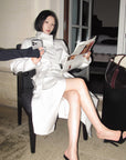 Hydrae Ivory High-Neck Belted Longline Trench Coat with Sculpted Raglan Seams